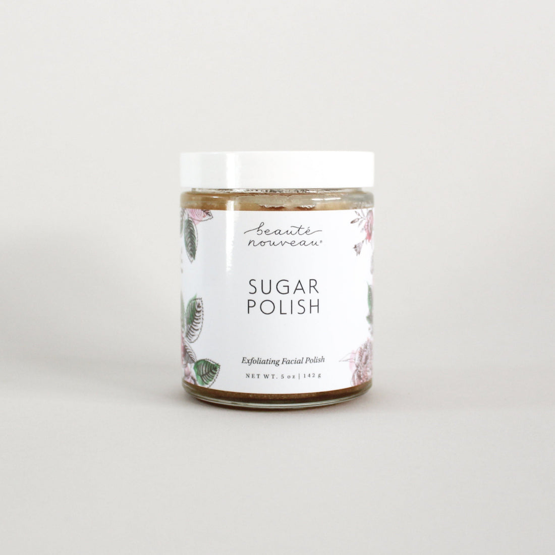 All-natural sugar face polish on light background.