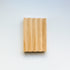 all-natural pine wood soap dish on white background.