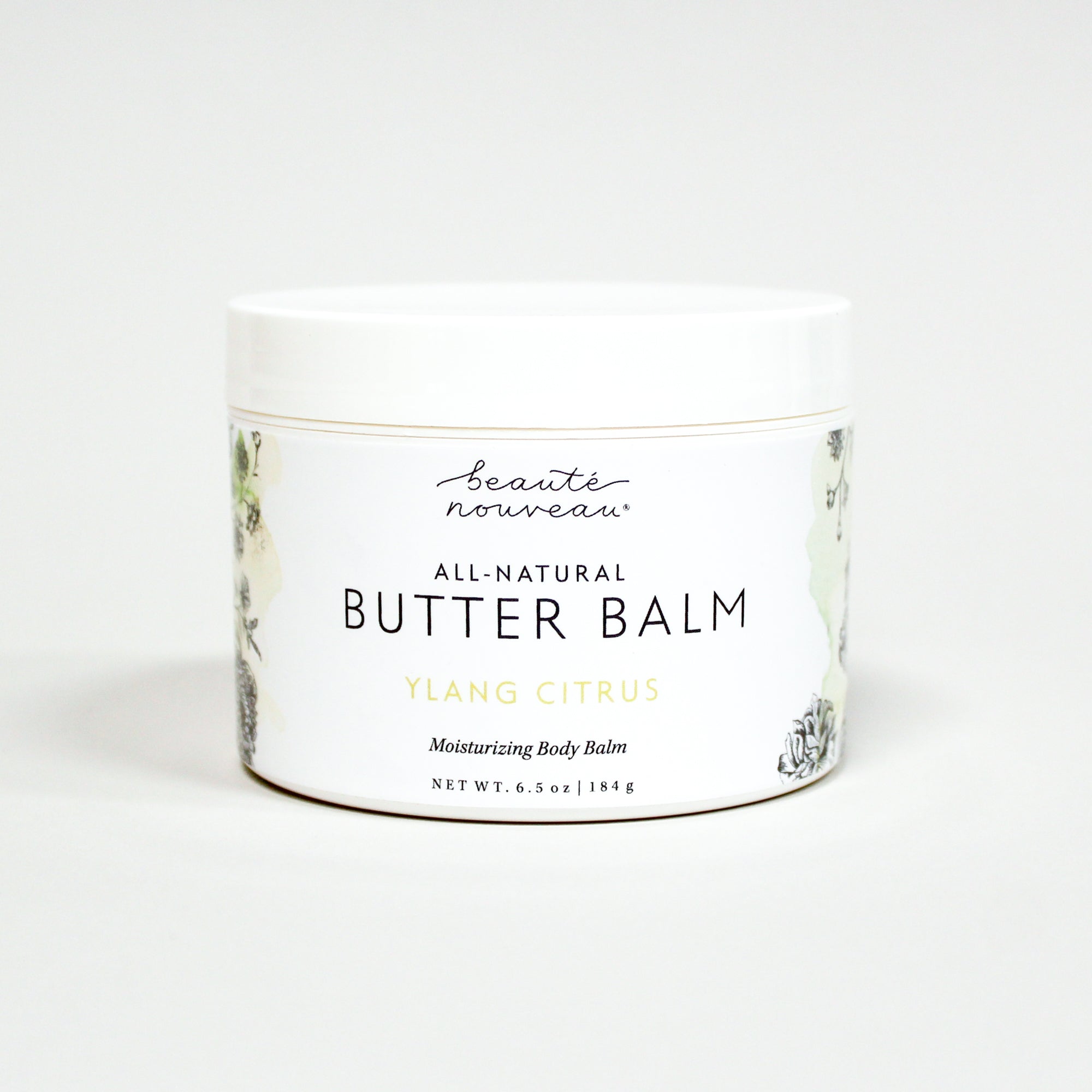 All-natural butter balm with Beauté Nouveau branding on a white background